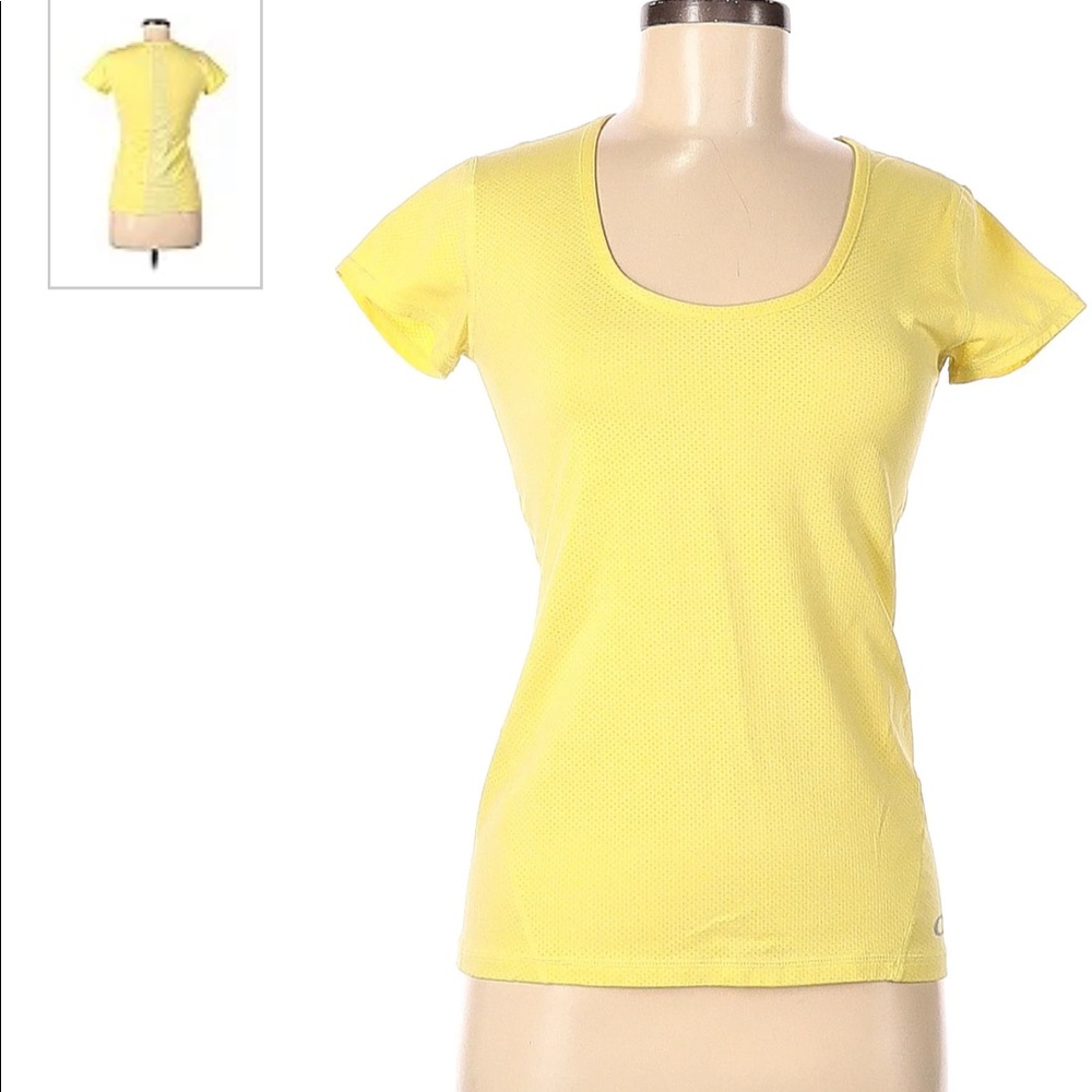 Oakley yellow short sleeve athletic top. Mesh panel going down the back.